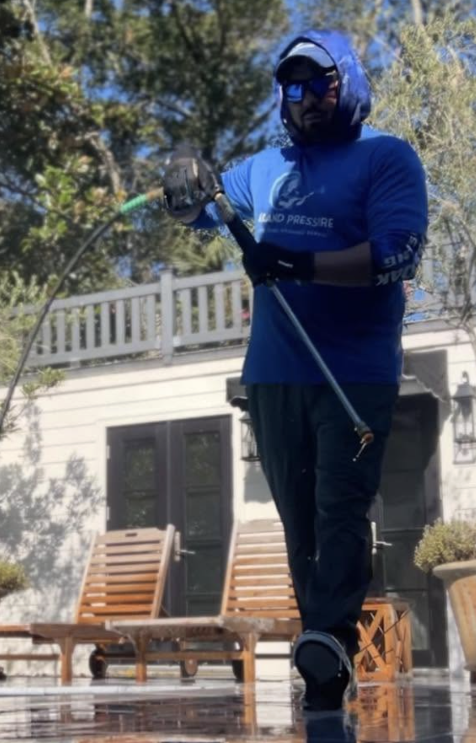 Kevin Atehortua of Island Pressure 904 pressure washing a pool deck in St. Augustine FL